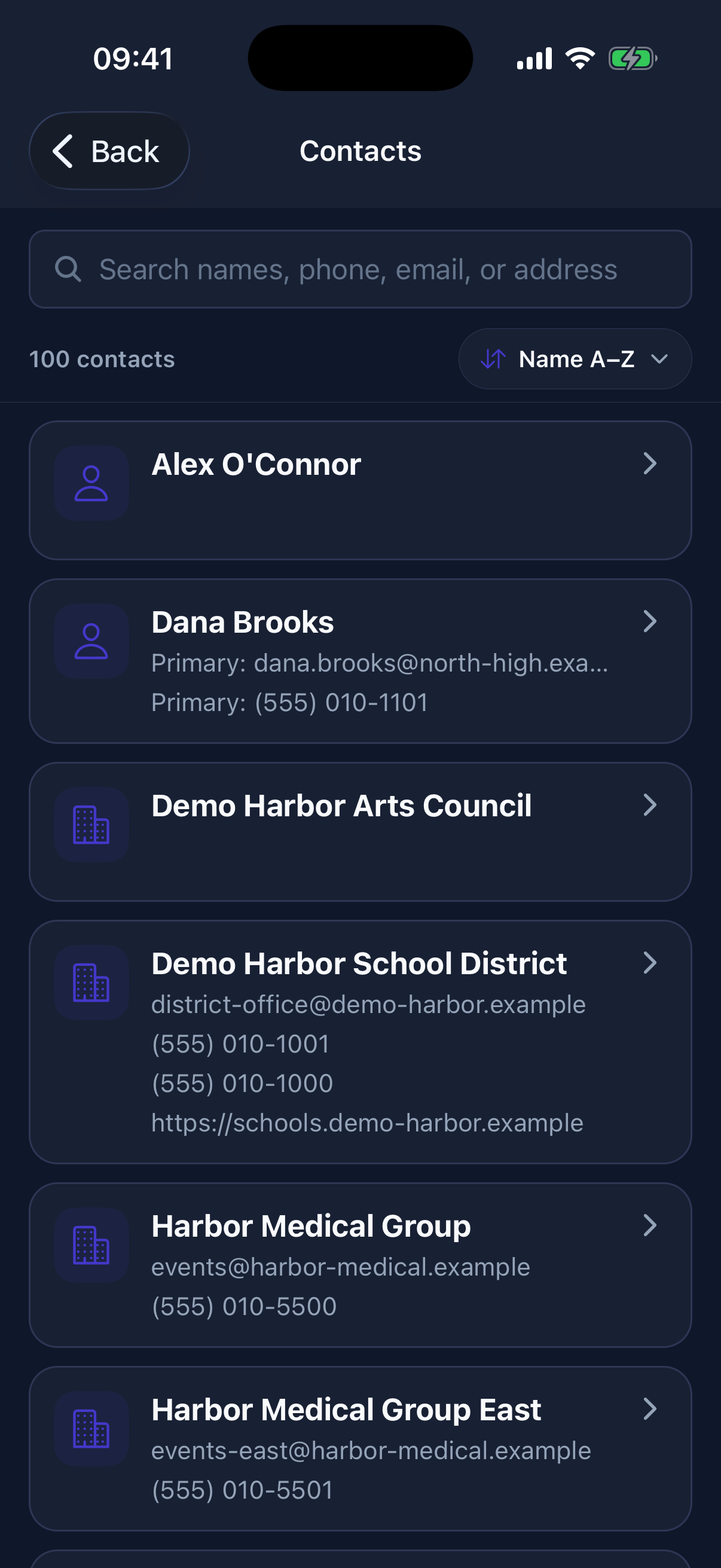 Approved members can search and sort the shared directory, distinguish people from organizations, and see primary contact details at a glance.